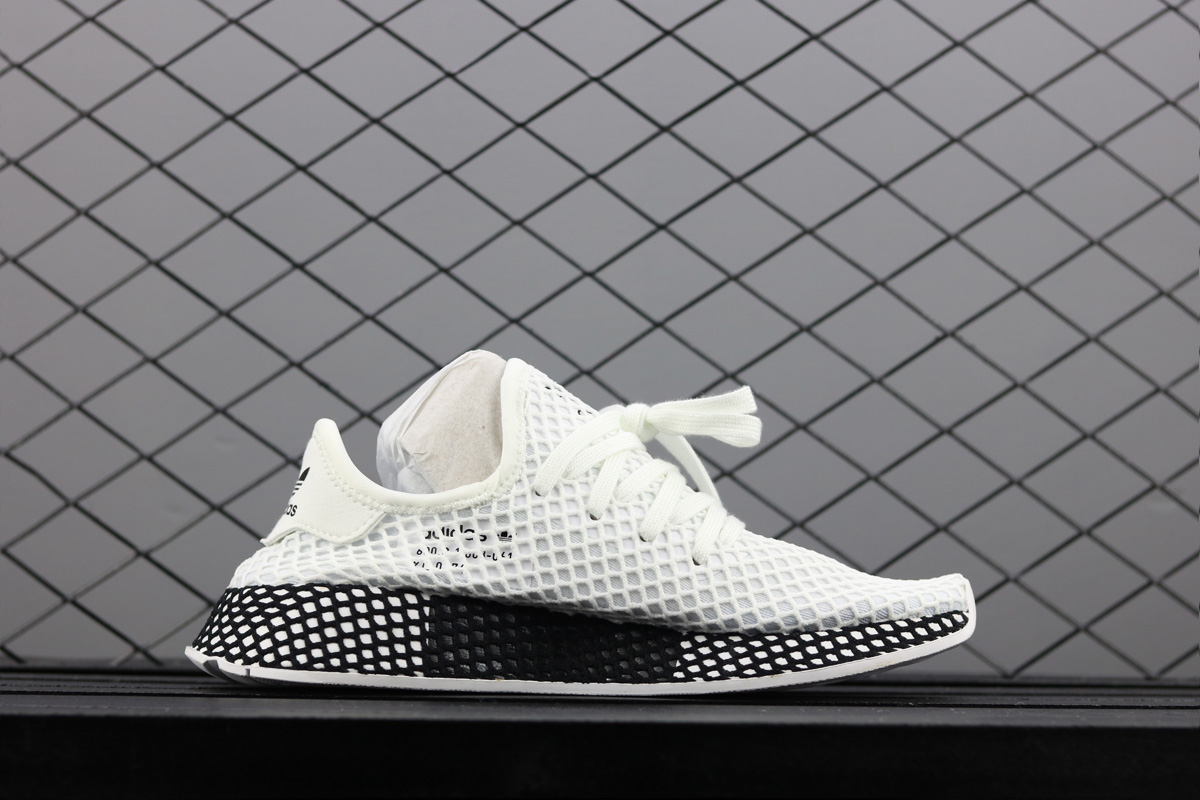 white and black adidas deerupt