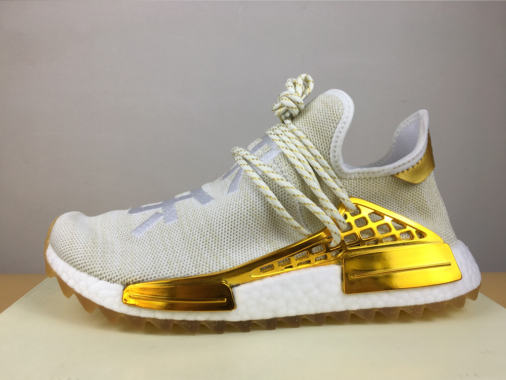 gold and white nmd