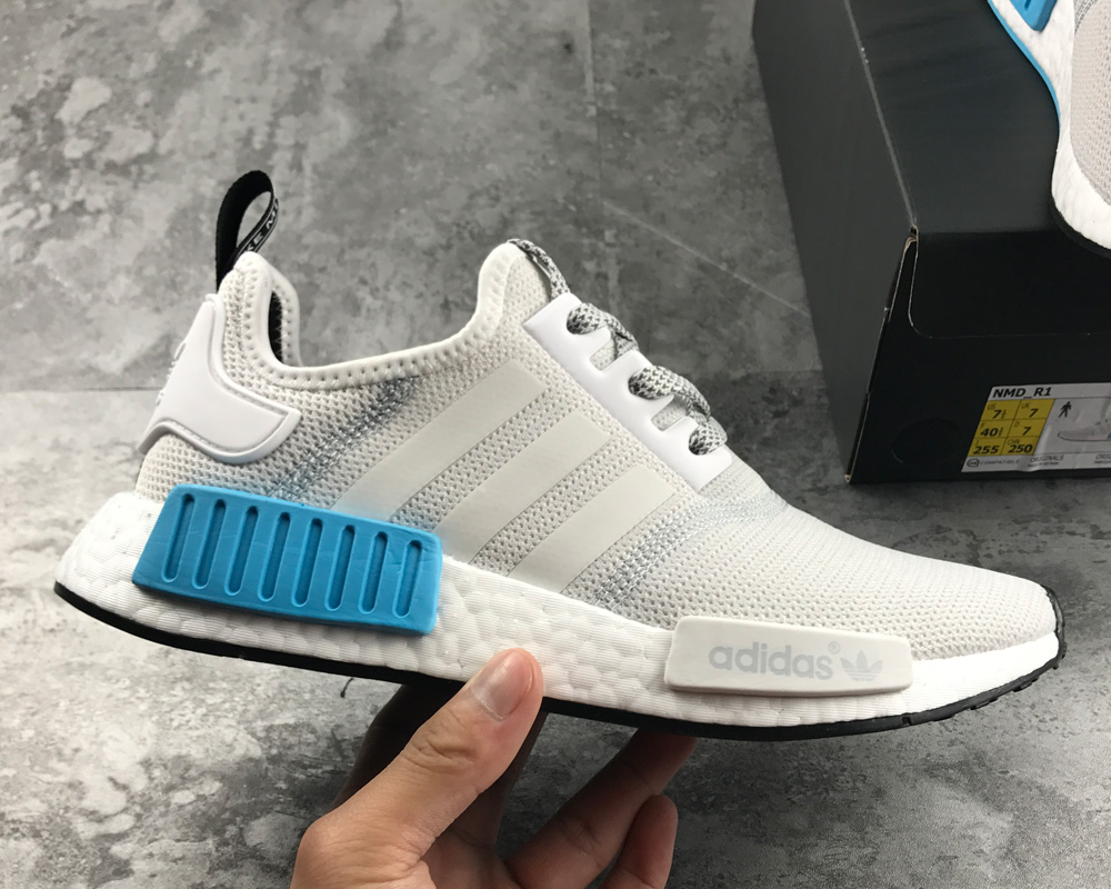grey and white adidas nmd