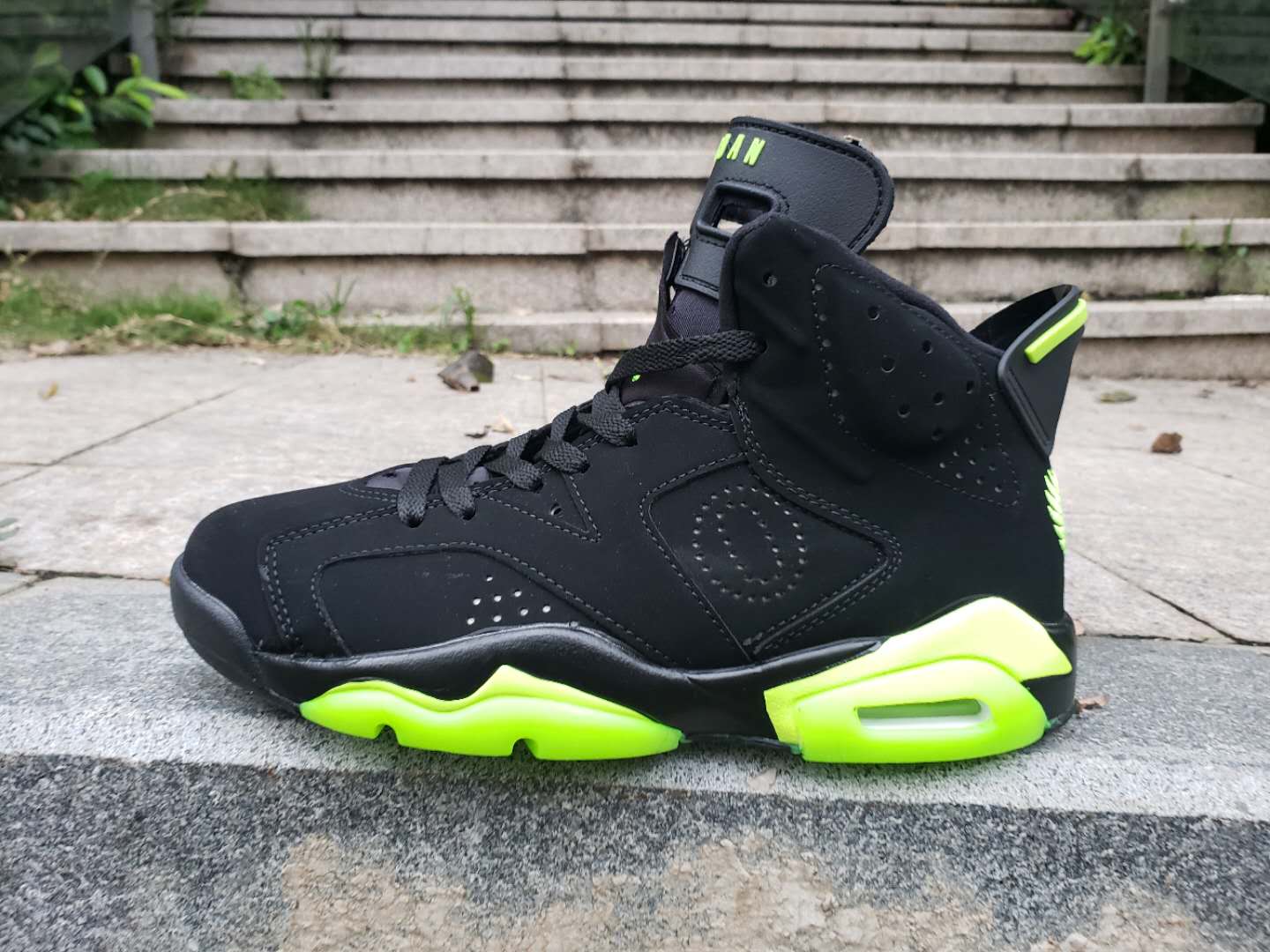 jordan shoes black and green