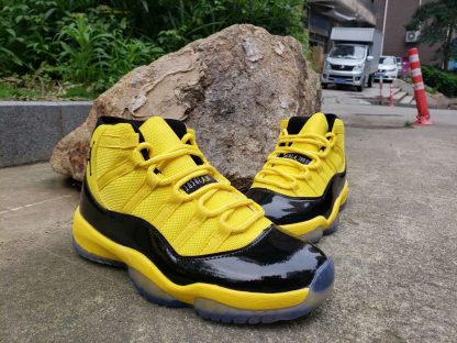 jordan 11 black and yellow