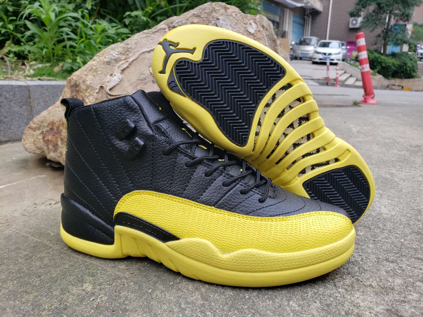 black and yellow jordan 12's