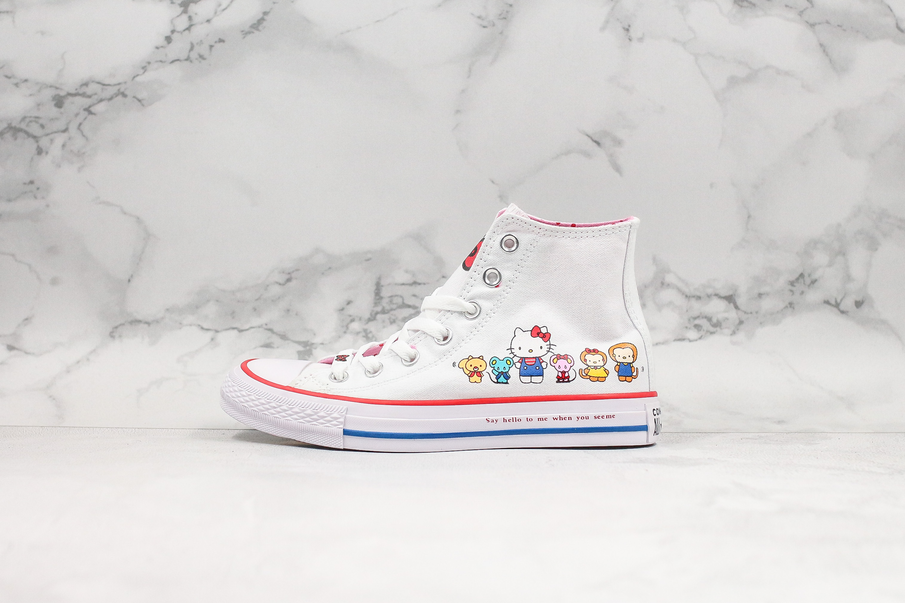 hello kitty converse pink high tops