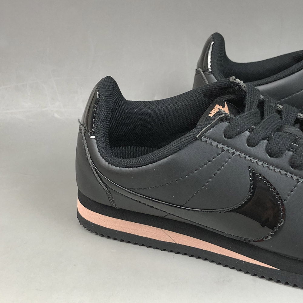 black nikes with rose gold swoosh