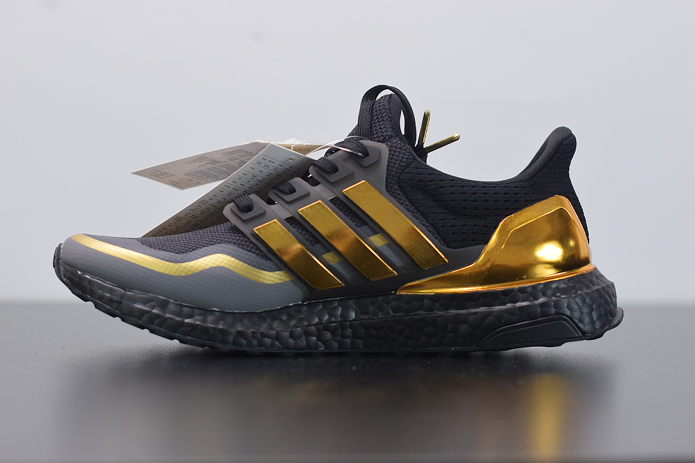 ultra boost black with gold