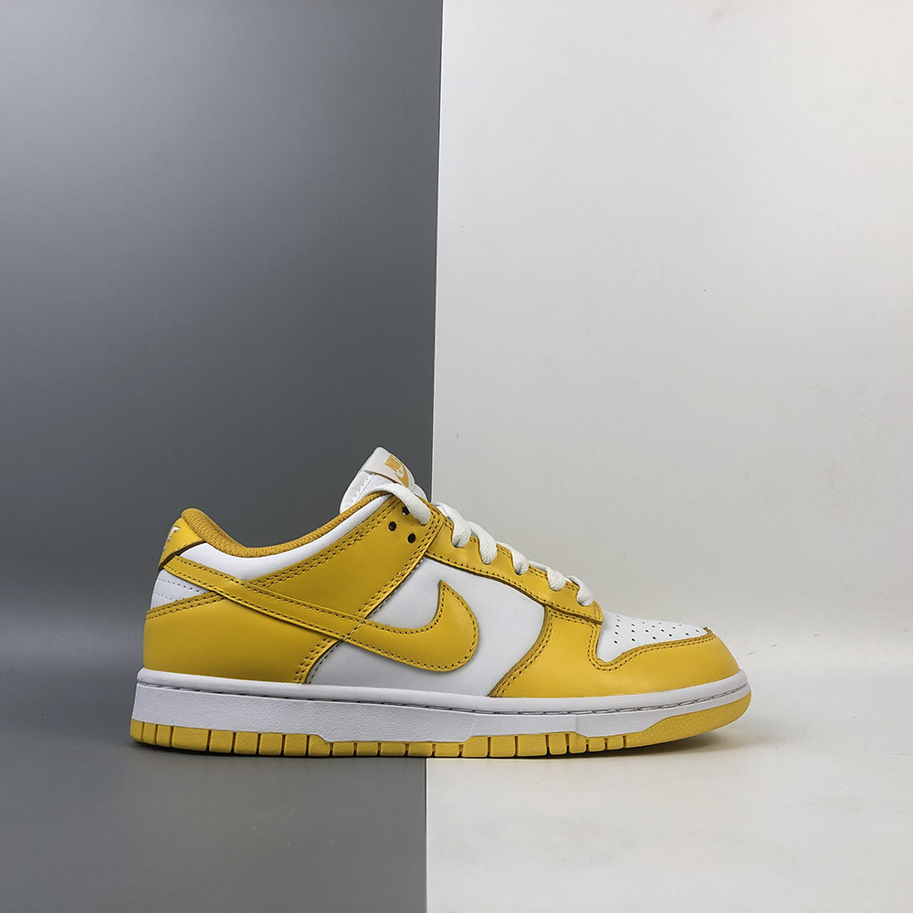 nike yellow and white shoes