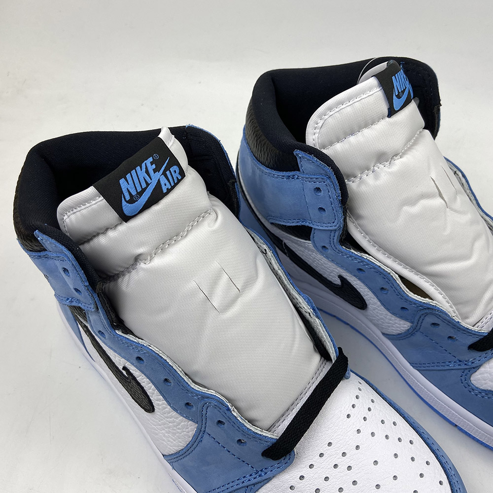 white university blue black jordans